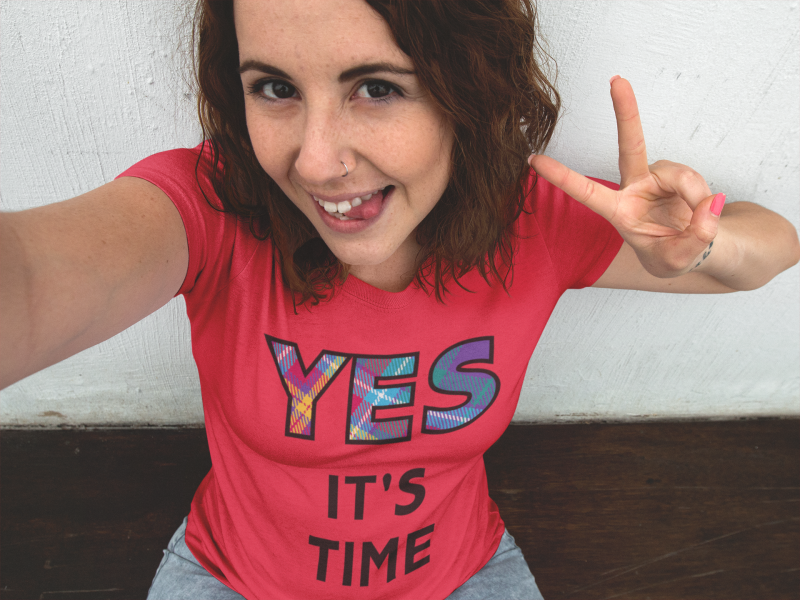 YES-TARTAN-trendy-girl-wearing-a-round-neck-t-shirt-taking-a-selfie-with-a-funny-face-a12901
