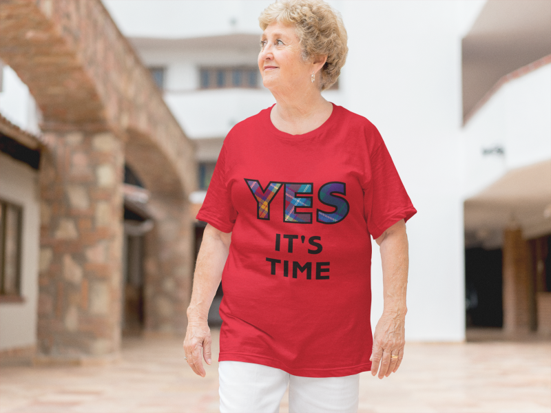 YES-TARTAN-smiling-white-elderly-woman-wearing-a-t-shirt-mockup-a10938