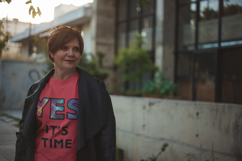 YES-TARTAN-lady-wearing-a-t-shirt-mockup-walking-down-the-street-a20729