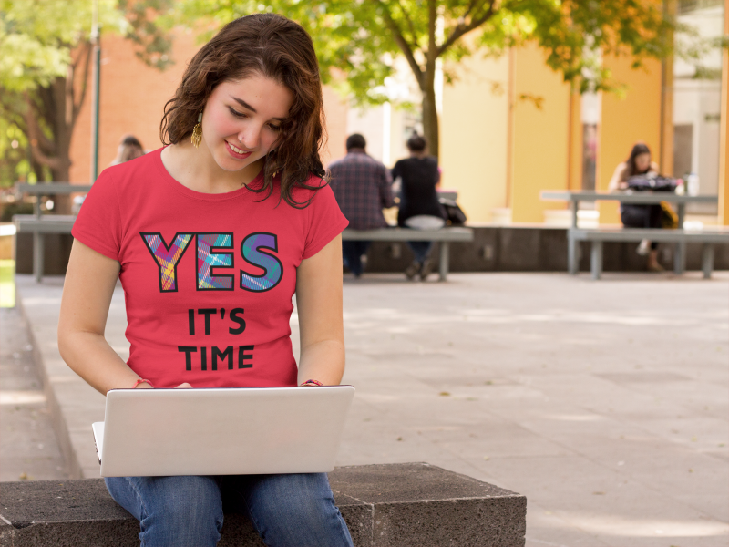 YES-TARTAN-girl-at-school-working-on-her-laptop-t-shirt-mockup-a9182